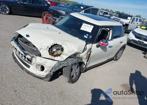 2016 Mini Hardtop Cooper z USA, uszkodzony, nr VIN WMWXU1C55G2D11437